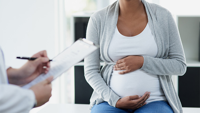 Pregnant woman in doctor's office