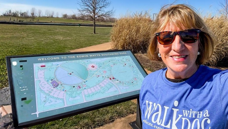Female smiling while walking outdoors