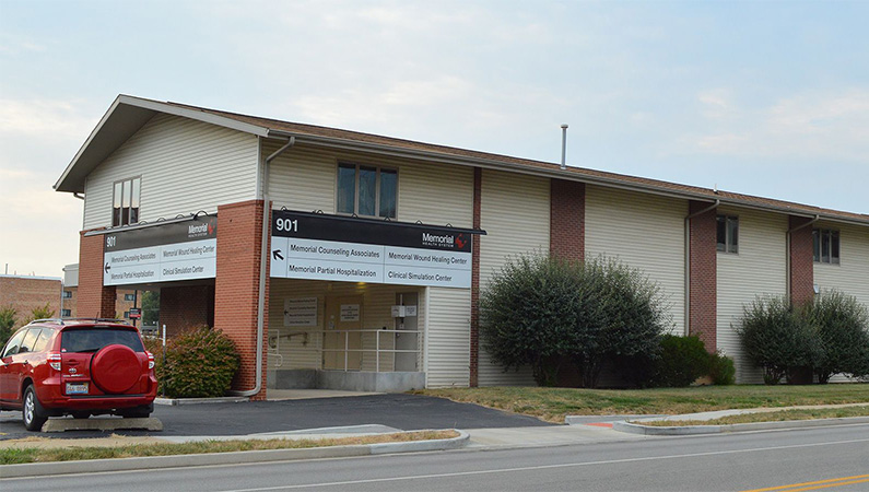 Exterior medical office building in Springfield, Illinois with yellow siding