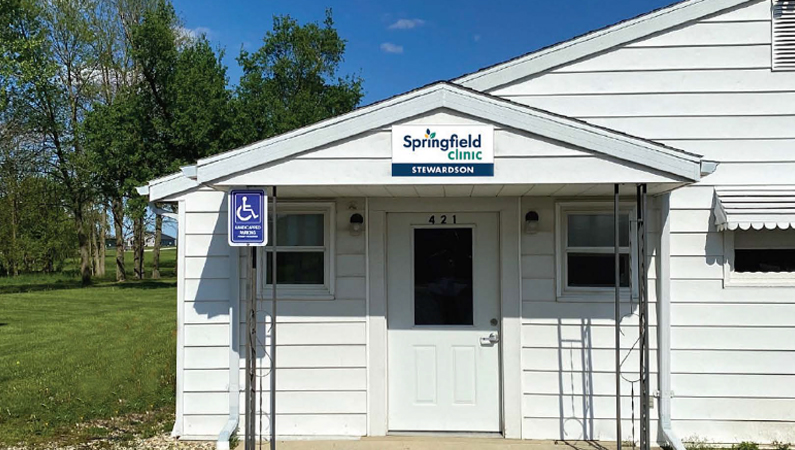 Exterior of white homely medical office building in Stewardson, Illinois