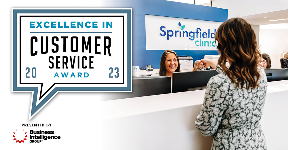 Excellence in Customer Service Award logo over a photo of a patient checking in.