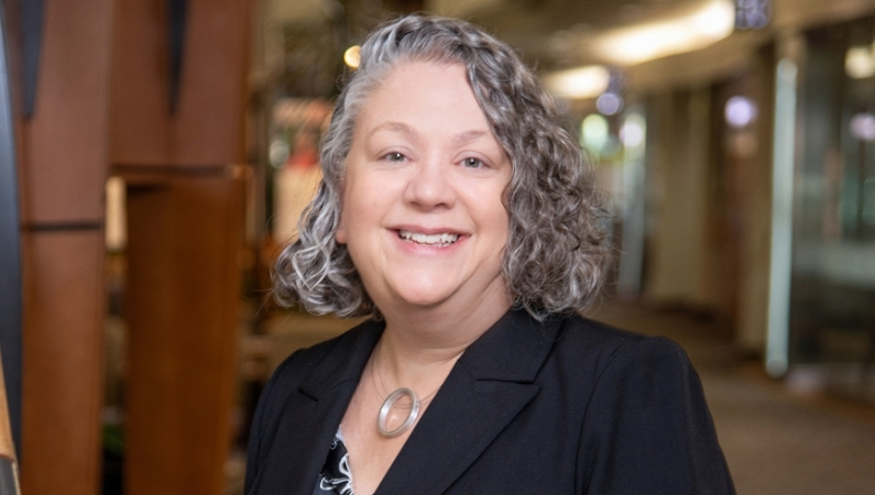 Rebecca Birenbaum smiling in professional headshot