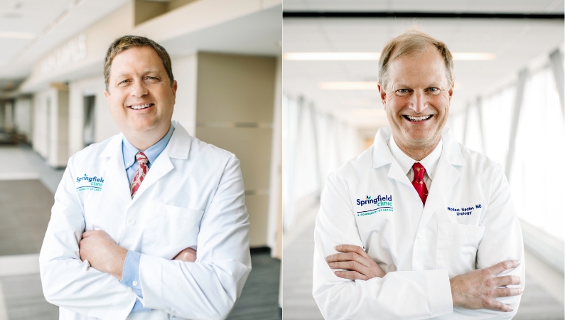 Two urology physician posing in office setting