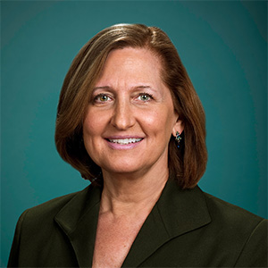 Professional headshot of female vascular surgery doctor.