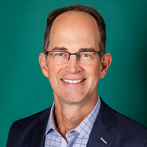 Male family medicine doctor headshot.