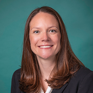 Female general surgery doctor headshot.