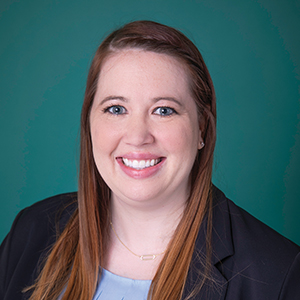 Female family medicine nurse practitioner headshot.