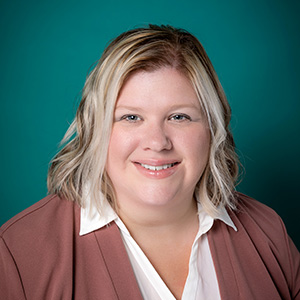 Female family medicine doctor professional headshot.