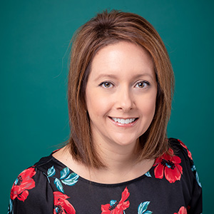 Female nurse practitioner professional headshot.