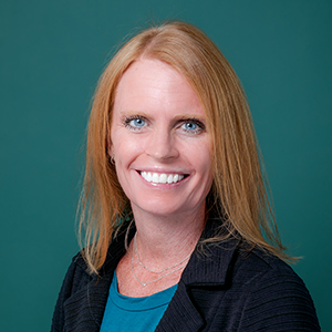 Female nurse practitioner professional headshot.