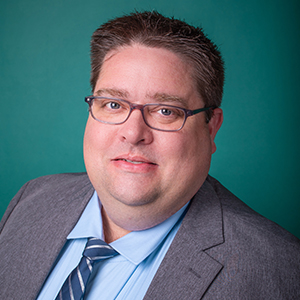 Male the cancer center doctor headshot