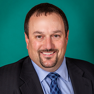 Male general surgery doctor headshot.