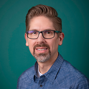 Male pediatrics doctor headshot