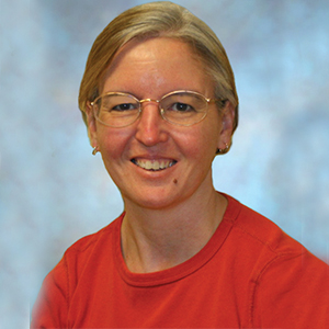 Female urgent care doctor headshot