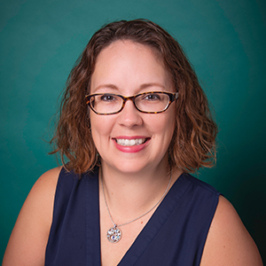 Female orthopedics nurse practitioner headshot.