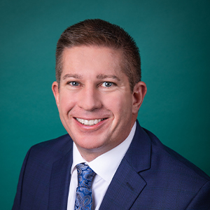 Male general surgery doctor professional headshot.