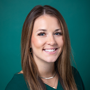 Female critical care nurse practitioner professional business headshot.