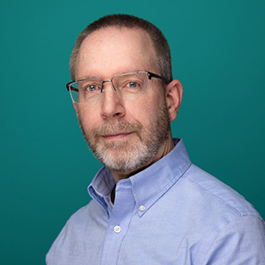 Male smiling in professional headshot