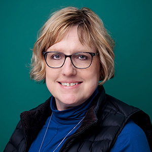 Female nurse practitioner professional headshot.