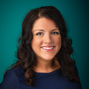 Female nurse practitioner professional headshot.