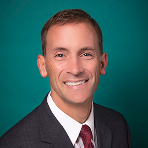 Male orthopedics doctor headshot.