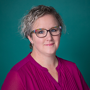 Professional headshot of Tami Domescik-rink