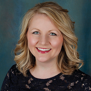 Female urgent care nurse practitioner headshot