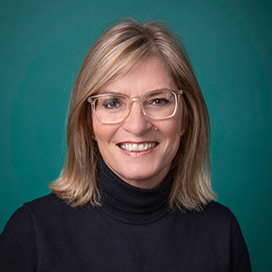 Female family medicine nurse practitioner headshot.