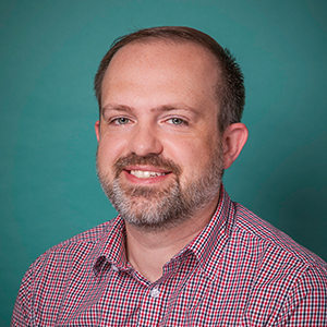 Male trauma & acute care surgery doctor headshot