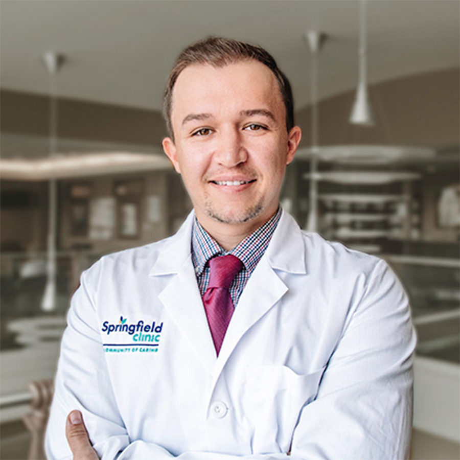 Tyler Evans, MD, with Springfield Clinic Plastic & Reconstructive Surgery professional headshot cropped.