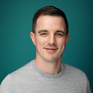 Male nurse practitioner professional headshot.