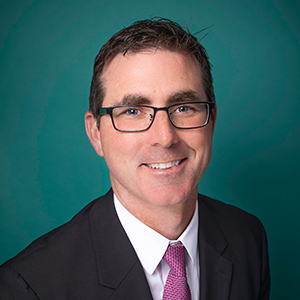 Male general surgery doctor headshot.