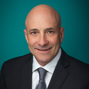 Professional headshot of cardiology physician.