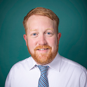 Male general surgery doctor headshot.
