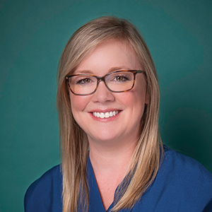Female orthopedics nurse practitioner headshot.