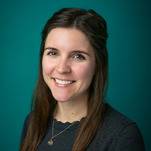 Female physical therapist smiling in professional headshot.