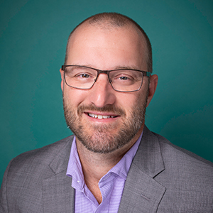 Male general surgery doctor headshot.