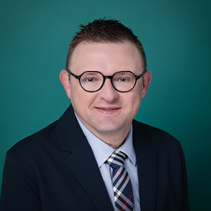 Professional headshot of a hospital medicine male doctor.