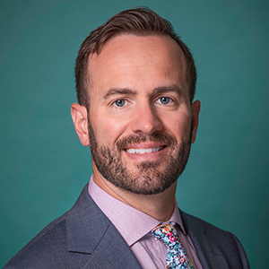 Male general surgery doctor headshot.