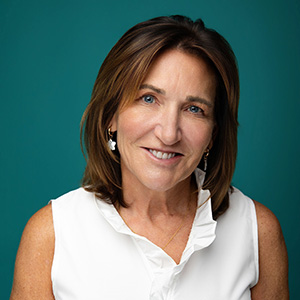 Female nurse smiling in professional headshot
