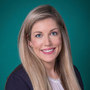 Female family medicine nurse practitioner headshot.