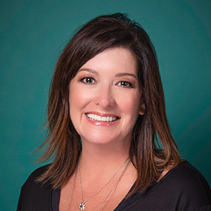Female orthopedics nurse practitioner headshot.