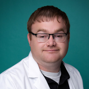 Professional headshot of male nurse practitioner
