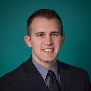 Male nurse practitioner headshot.