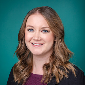 Female nurse practitioner professional headshot.