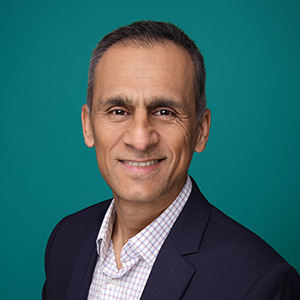 Professional headshot of vascular medicine physician.