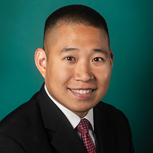 Male trauma & acute care surgery doctor headshot
