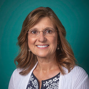 Female general surgery doctor headshot.