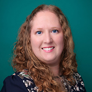 Female nurse practitioner professional headshot.