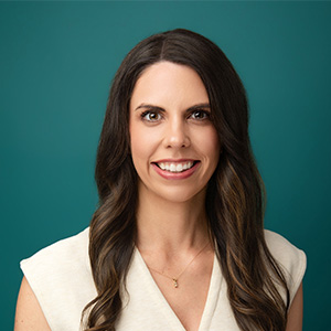 Female physician smiling in professional headshot